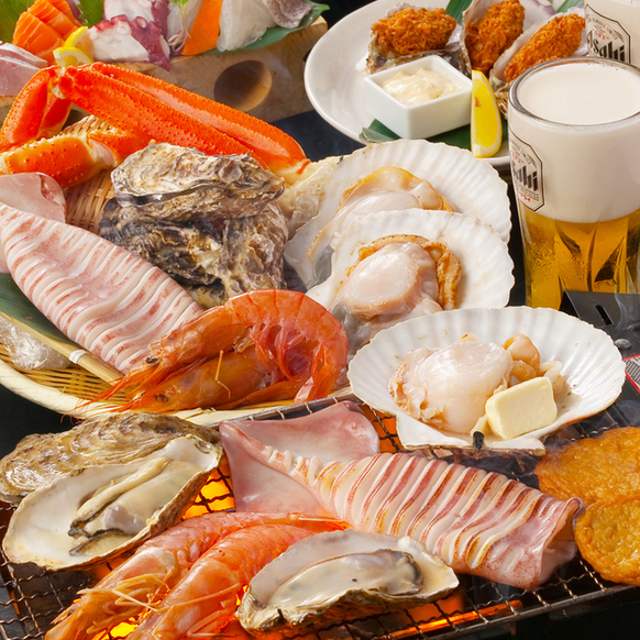浜焼きを堪能♪カニカキにウニ板刺盛で贅沢コース｜博多磯っこ商店